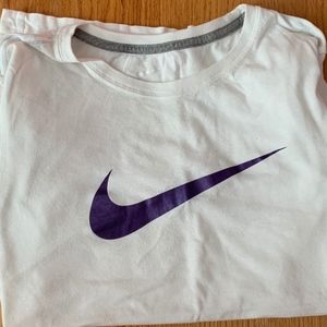 white nike shirt with purple logo